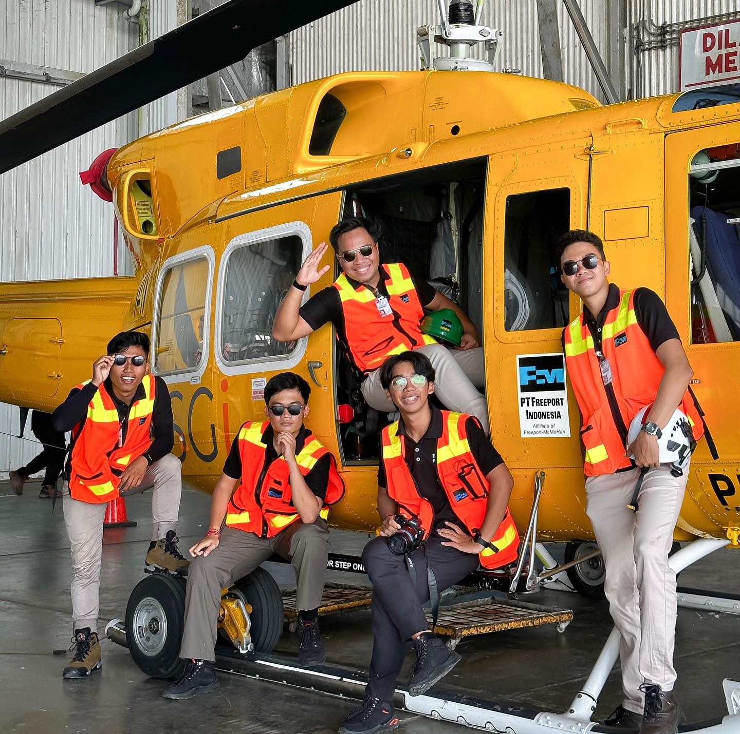 TDR FILMS crew beside a helicopter during production