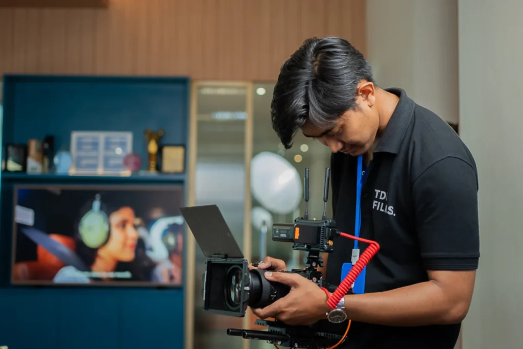 TVC pre-production planning, camera operator checking monitor on set, TDR FILMS